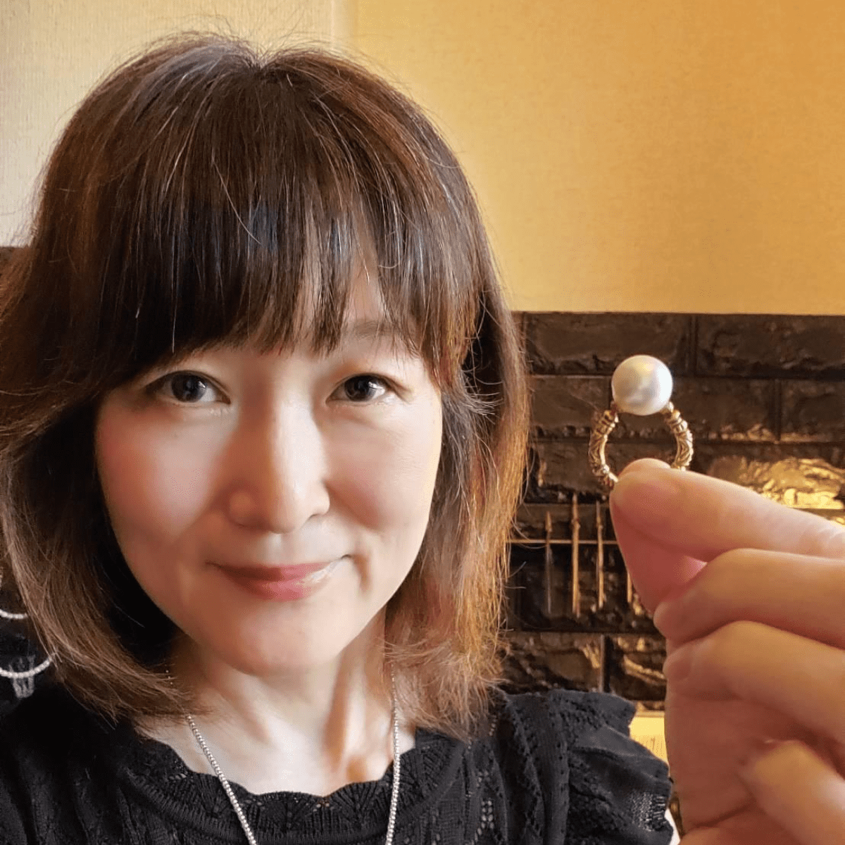 首藤 栄美